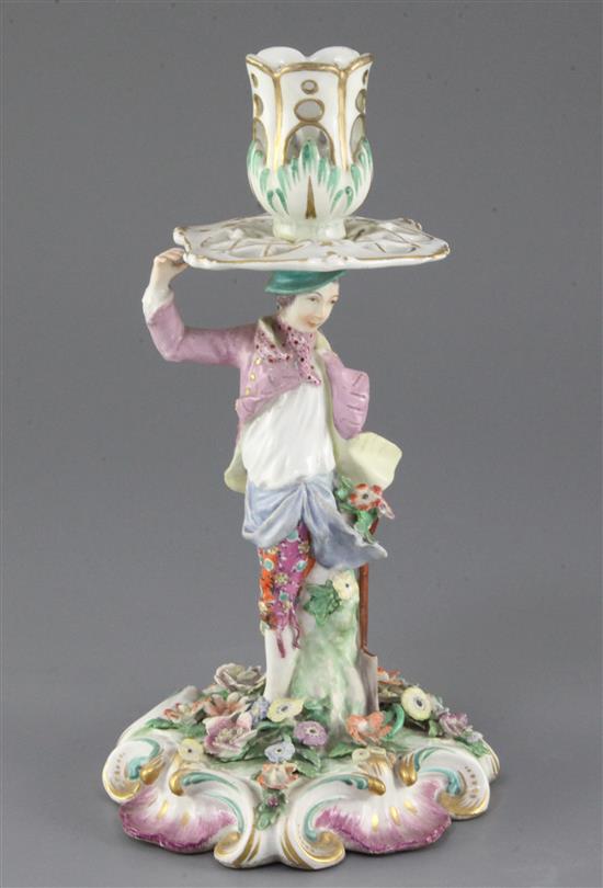 A Chelsea gardener candlestick figure, c.1760-5, 22cm, restorations and later fixing